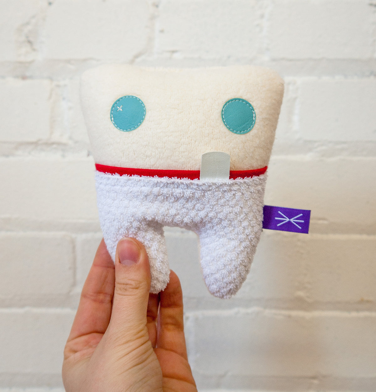 Petite Dent Peluche