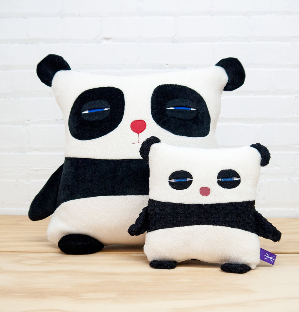 Panda coussin yeux bleus